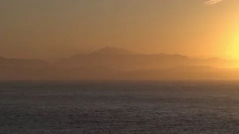 MistyMountainSunsetFIN Stock Footage 125708910