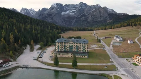 Misurina, Italy - 4K Flying towards Cristallo mountains Stock Footage 201210285
