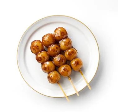 Mitarashi dango placed on a white background Stock Photos