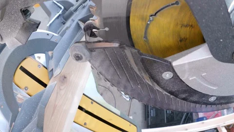 Miter Saw Chopping a Two By Four Stock Footage 128703522