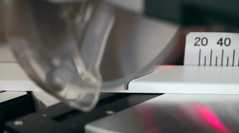 Miter saw cutting plank Stock Footage 32612182