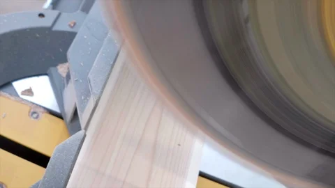 Miter Saw Cutting Two By Four in Slow Motion Stock Footage 128703543