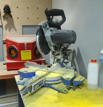 Miter saw made by Scheppach set for work at the workshop Stock Photos