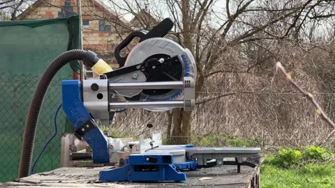 Miter saw ready for woodworking in the backyard Vídeo Stock 243664617