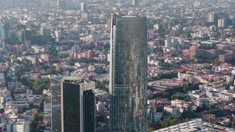 Mitikah Tower with drone parallax effect, featuring megacity of Mexico City in Stock-Footage 304853135