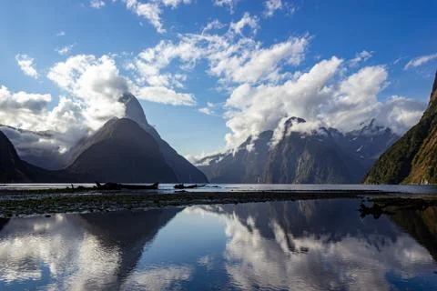 Mitre Peak on sunset with nice clouds, Milford Sound, Fiordland, South Island Stock Photos