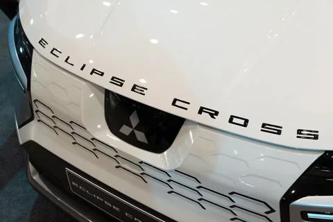 Mitsubishi Eclipse Cross front lettering and logo close-up at ECAR Show 2026 Stock Photos