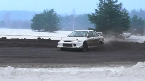 Mitsubishi Lancer Evolution 4 winter drift in snow Stock Footage 167009678