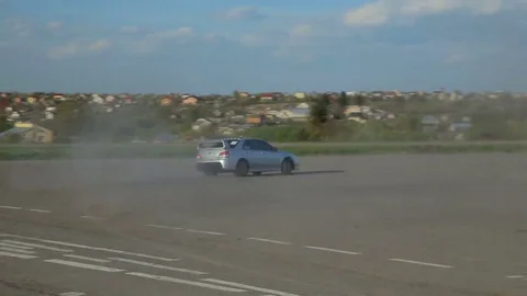 Mitsubishi Lancer Evolution Subaru Impreza Drift drag racing Stock Footage 69245707