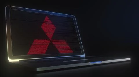 MITSUBISHI logo made with computer code on the laptop screen. Editorial 库存插图