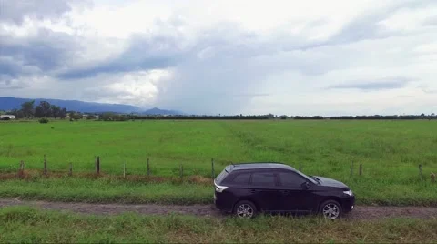 Mitsubishi Outlander on a rural trail Stock Footage 59643296