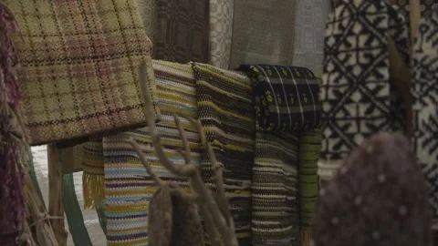 Mittens and blankets with folk patterns at the market Stock Footage 251846194
