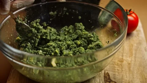 Mix all ingredients and lay the egg .Tasty Low-Calorie Green Burgers. Food for Stock Footage 156723261
