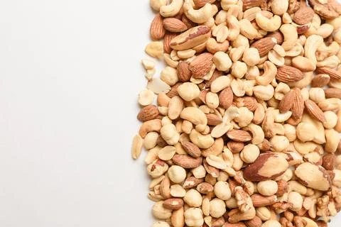 Mix of almonds, hazelnuts, peanuts, cashew and Brazil nuts. Tasty food, health Stock Photos