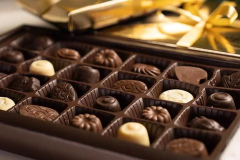 Mix of chocolates in a box. Stock Photos