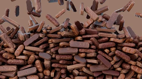 Mix of chocolates falling down from above and filling the screen. Vídeo Stock 98634909