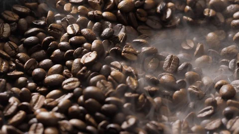 Mix coffee beans in a burning pan Stock Footage 121539772