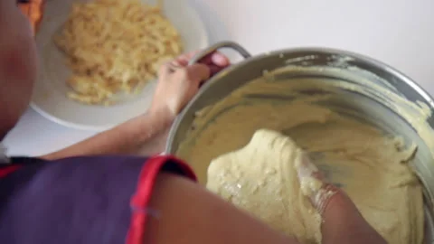 Mix corn dough masa with hands for tamales 37 Stock Footage 135742367