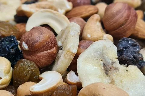 Mix of different nuts background Stock Photos