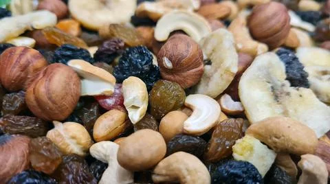 Mix of different nuts background Stock Photos