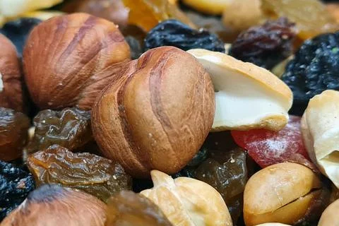 Mix of different nuts background Stock Photos