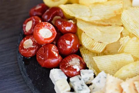 Mix of different snacks and appetizers. Stock Photos