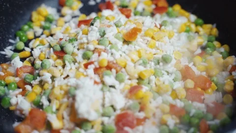 Mix Of Different Vegetables Fried In A Hot Frying Pan Stock Footage 122173660