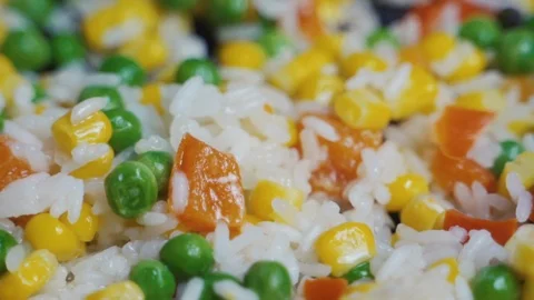 Mix Of Different Vegetables Fried In A Hot Frying Pan Stock Footage 122173751
