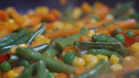Mix Of Different Vegetables Fried In A Hot Frying Pan 動画素材 122174037