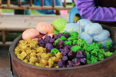 Mix Dim sum dumpling or Shumai and variety of steam bun on a big wooden baske Stock Photos
