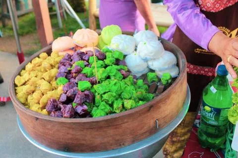 Mix Dim sum dumpling or Shumai and variety of steam bun on a big wooden baske Stock Photos