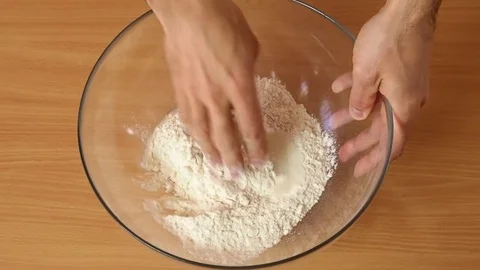 Mix to a dough. Making Puff Pastry Series. 库存影片 77222360