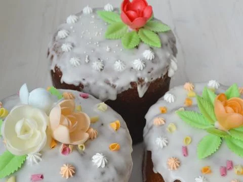 Mix of Easter cakes on a white table. Stock Photos
