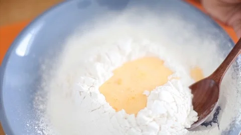 Mix eggs and flour , Cake making Stock Footage 113406027