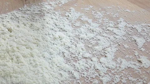 Mix the flour with black pepper on table, slow motion Stock Footage 75487896