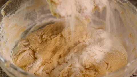 Mix flour in the dough 4K Stock Footage 96330680