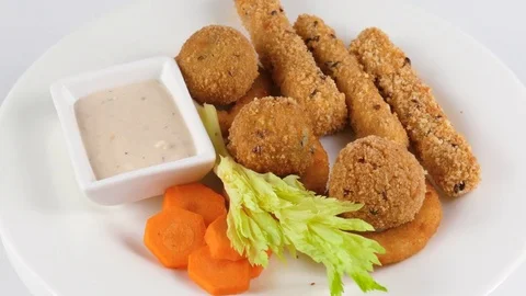 Mix of fried and breaded snacks, mozzarella cheese sticks Stock Footage 78528188