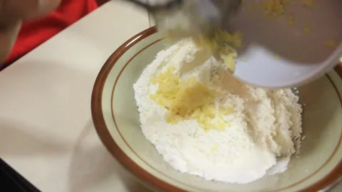 Mix garlic with flour. someone makes a mixture of flour and garlic Stock Footage 334268237
