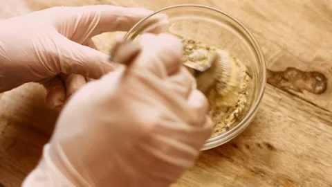 Mix the mixture of ingredients, black pepper, mustard and minced garlic. 4k Stock Footage 156445551