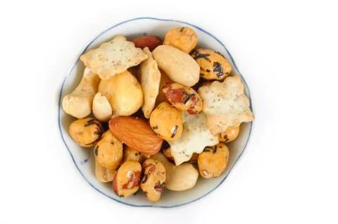 Mix nuts and corn frame on white background Stock Photos