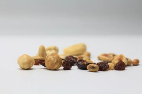 Mix of nuts close up caju nuts, hazelnuts and dehydrated cranberries Stock Photos