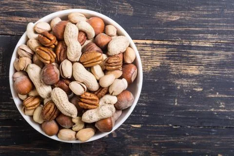 Mix of nuts in plate Stock Photos