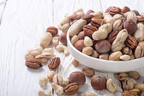 Mix of nuts in plate Stock Photos