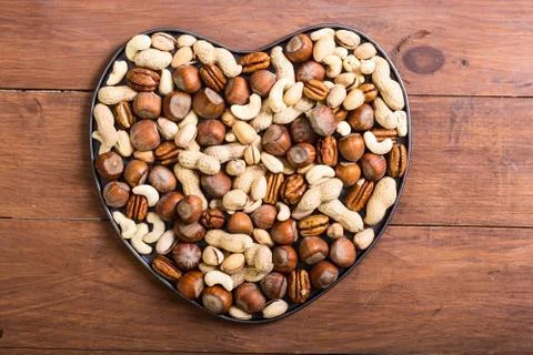 Mix of nuts in plate Stock Photos