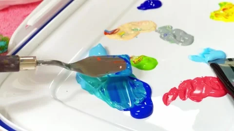 To mix paint with palat Stock Footage 264150311
