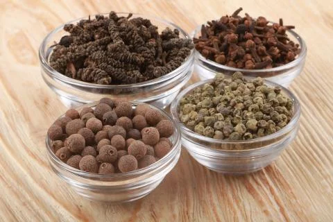 Mix of pepper on an old table Stock Photos