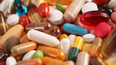 Mix of Pills and Tablets of Various Colors Stock Footage 271006558