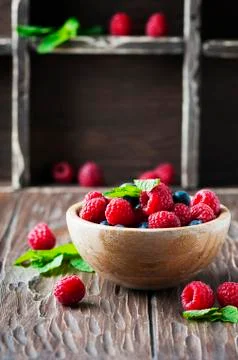 Mix of raspberry and blueberry with mint Stock Photos