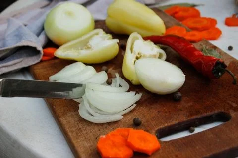 Mix of sliced vegetables on the table. Stock Photos