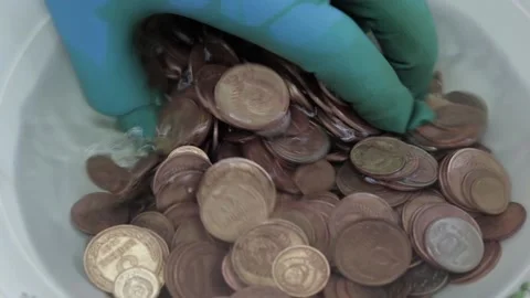 Mix USSR coins in solution and wash Stock Footage 130768347